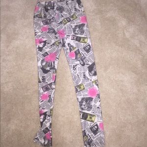Super cute Queen newsprint leggings